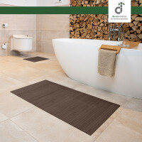 Drei rechteckige Badezimmerteppiche in verschiedenen Größen, jeweils mit vertikalen Linienmuster und einem dekorativen Element, das an eine Blume erinnert. Die Teppiche haben eine Breite von 17 mm und Längen von 40 cm, 50 cm und 60 cm sowie 50 cm, 80 cm und 100 cm. Ideal für die Verwendung im Badezimmer.