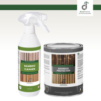 Zwei Bambus-Pflegeprodukt wurden leicht von oben fotografiert. Links steht eine weiße Sprühflasche mit grünem Etikett und der Aufschrift „Bamboo Cleaner“, rechts daneben eine graue Blechdose mit der Aufschrift „Bamboo Protector“. Oben rechts ist das DE-COmmerce Logo.